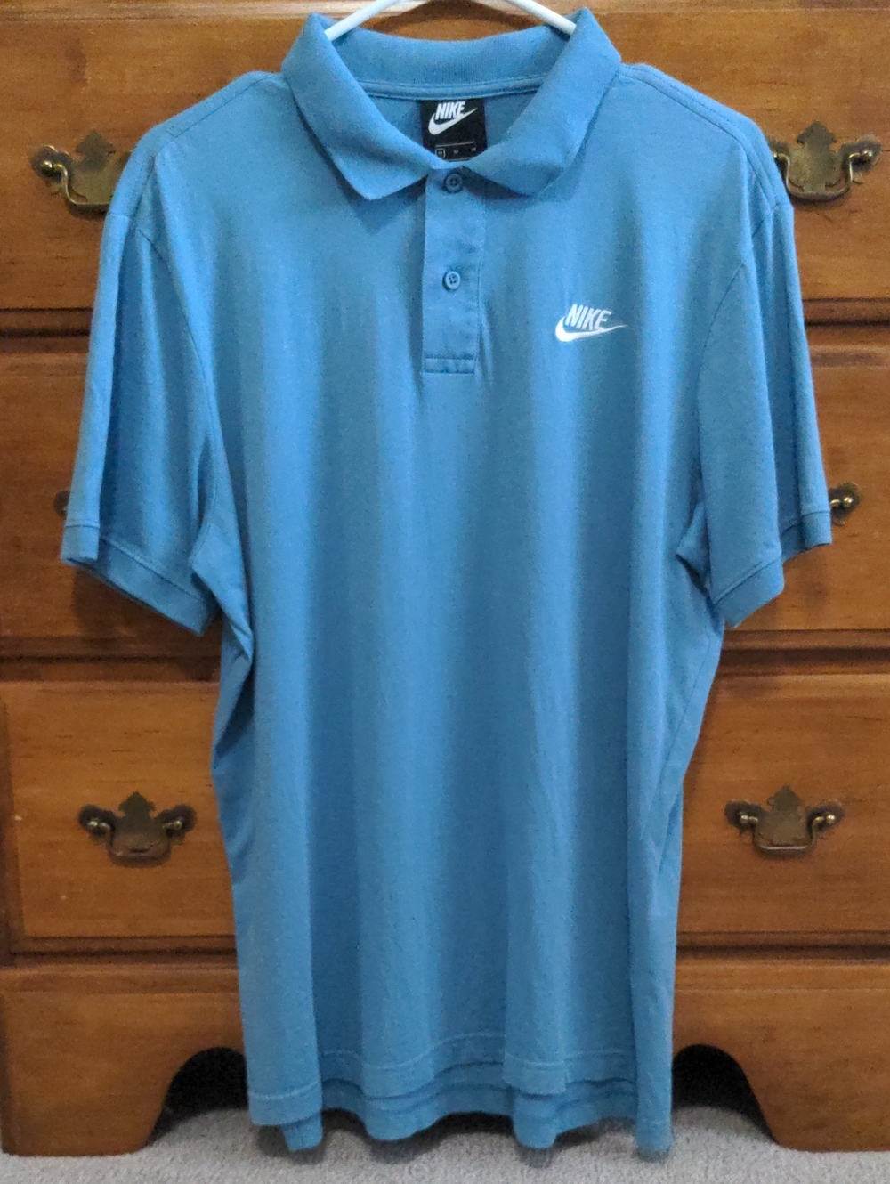 Nike Men’s Light Blue Polo with White Swoosh